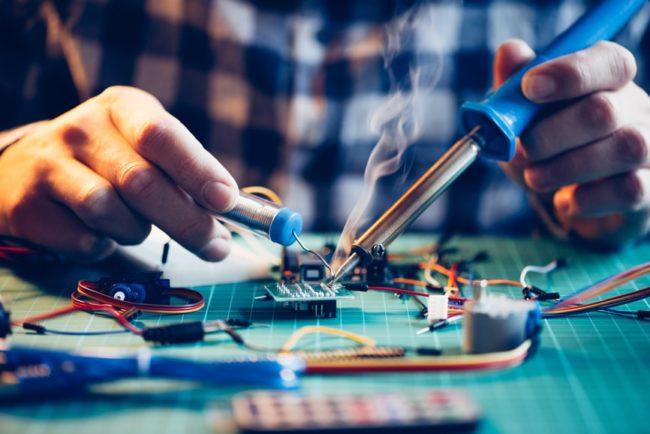 Man working with electrial components